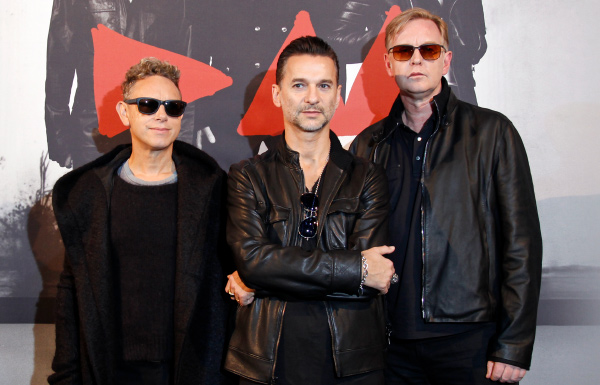 Depeche Mode pose during a photocall before a press conference in Paris